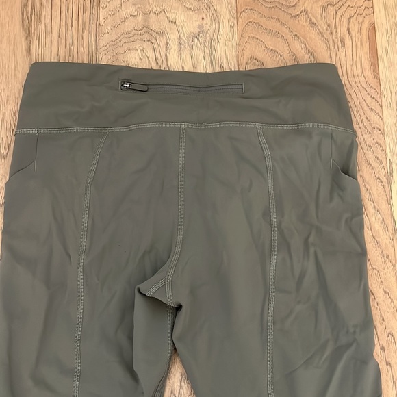 Olive green Lululemon leggings, hit at mid-calf with pockets galore!! - Picture 6 of 9